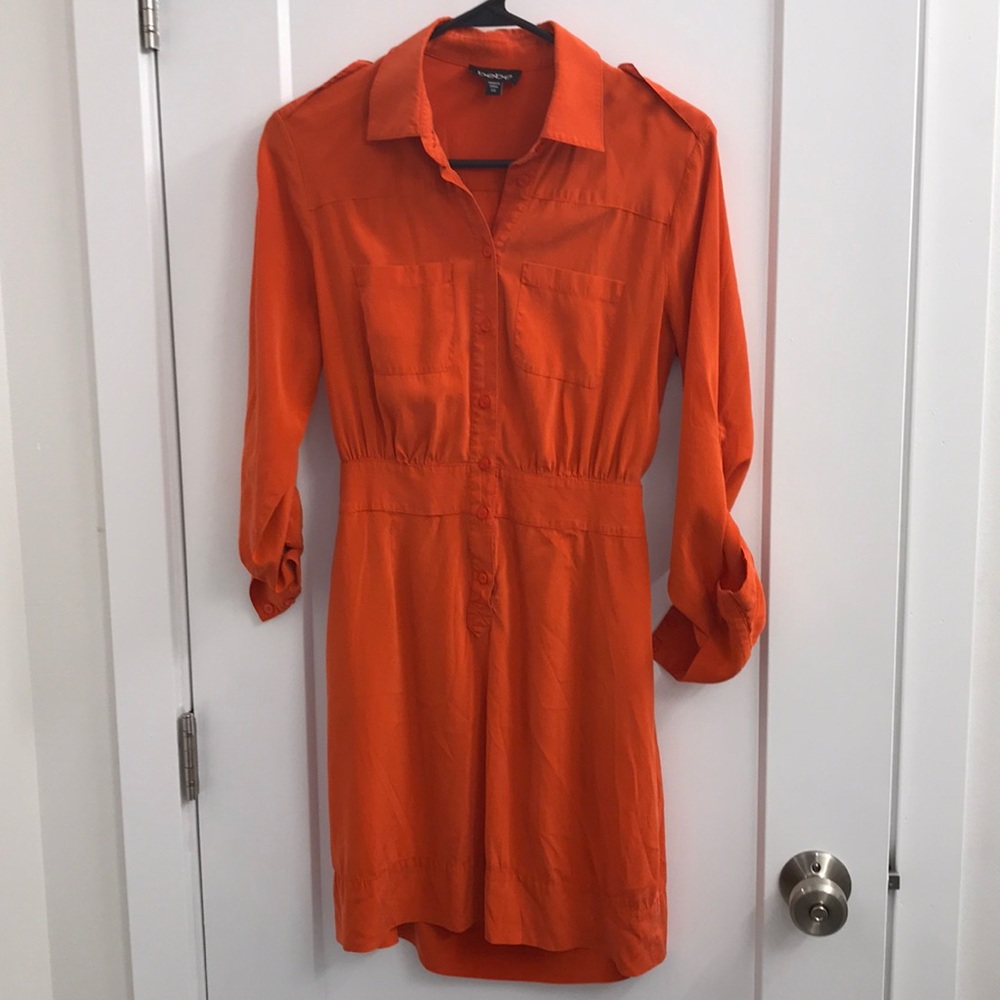 Bebe dress orange rust color open back slit